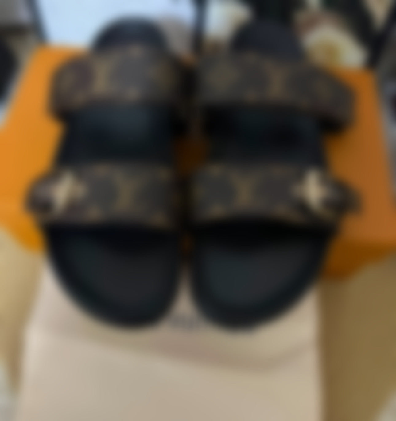 L***V****** sandals